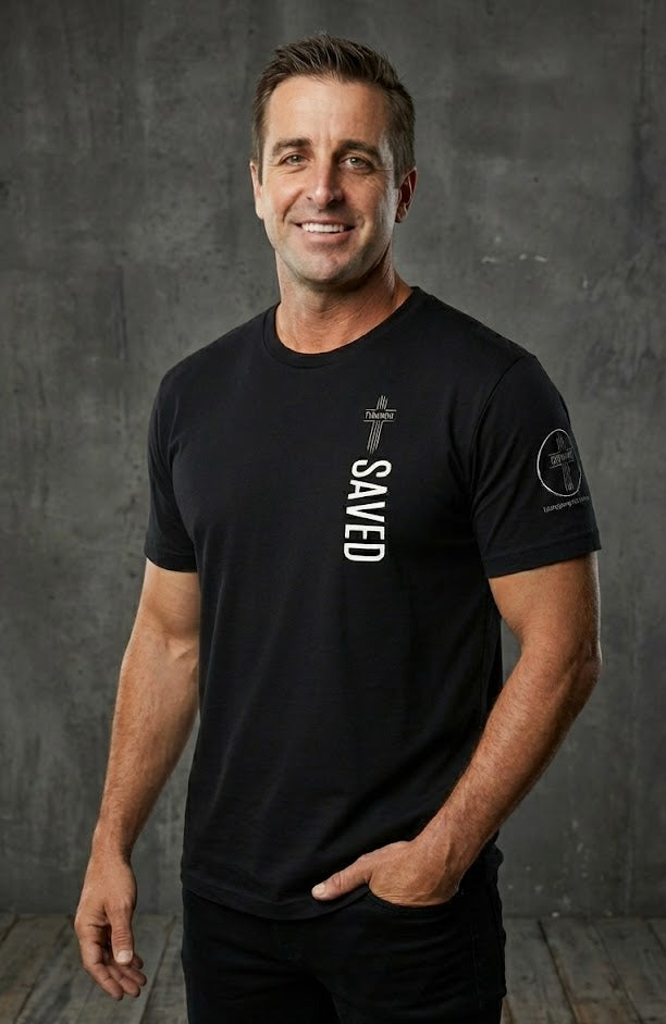 Man wearing a black t-shirt with text and graphics against a gray background
