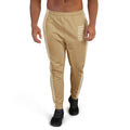 Beige jogger pants with 'TRUTH' branding on a white background